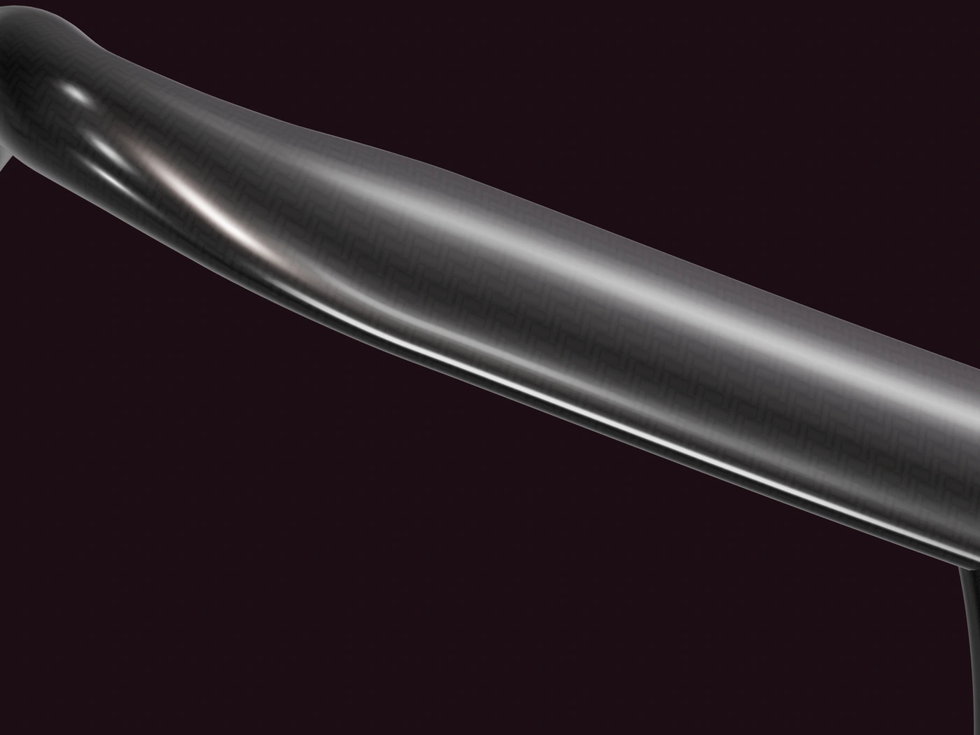 Close study of a curved carbon surface catching a narrow strip of light